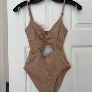 L*Space Shimmering Golden Goddess One Piece Swimsuit with Cutouts. Sexy!